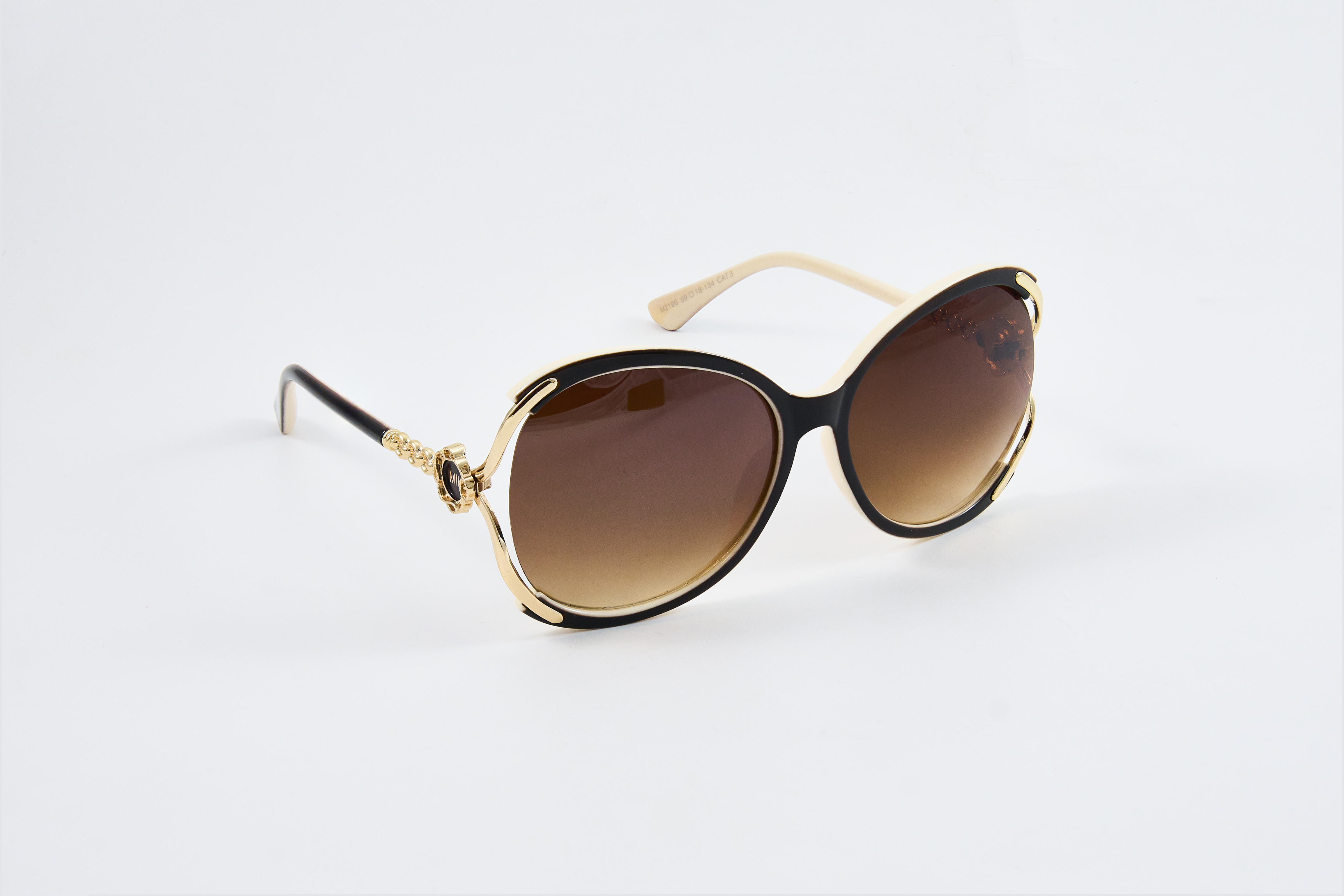 Golden Grace – Bruine oversized zonnebril met gouden details