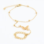 Gouden armband met parels en muntbedel