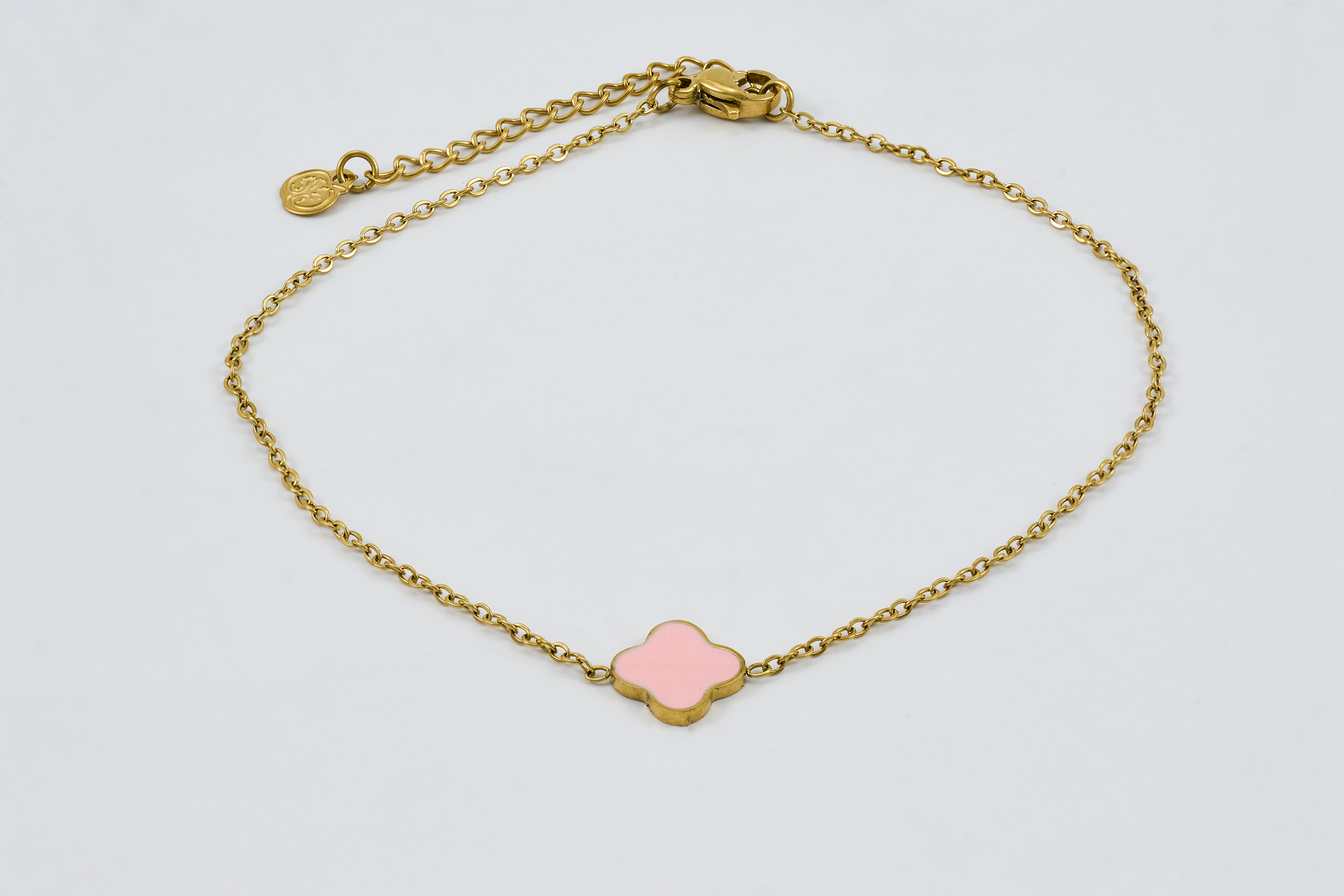 Gouden enkelband met roze natuursteen