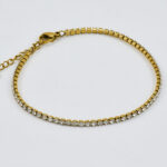 Gouden minimalistische schakelarmband met subtiele afwerking