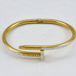 Gouden spijkerarmband