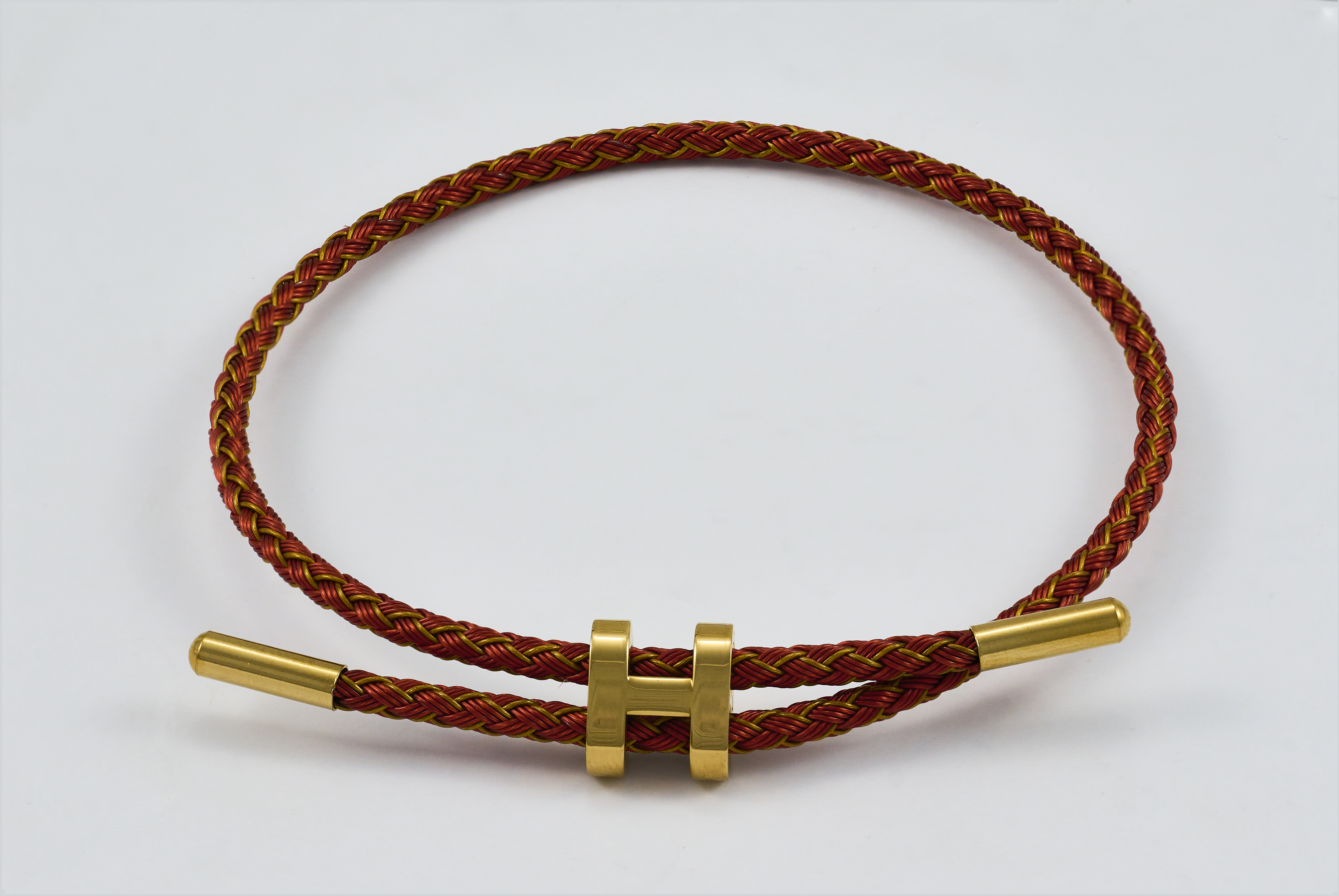 Rode koordarmband met gouden H-bar sluiting