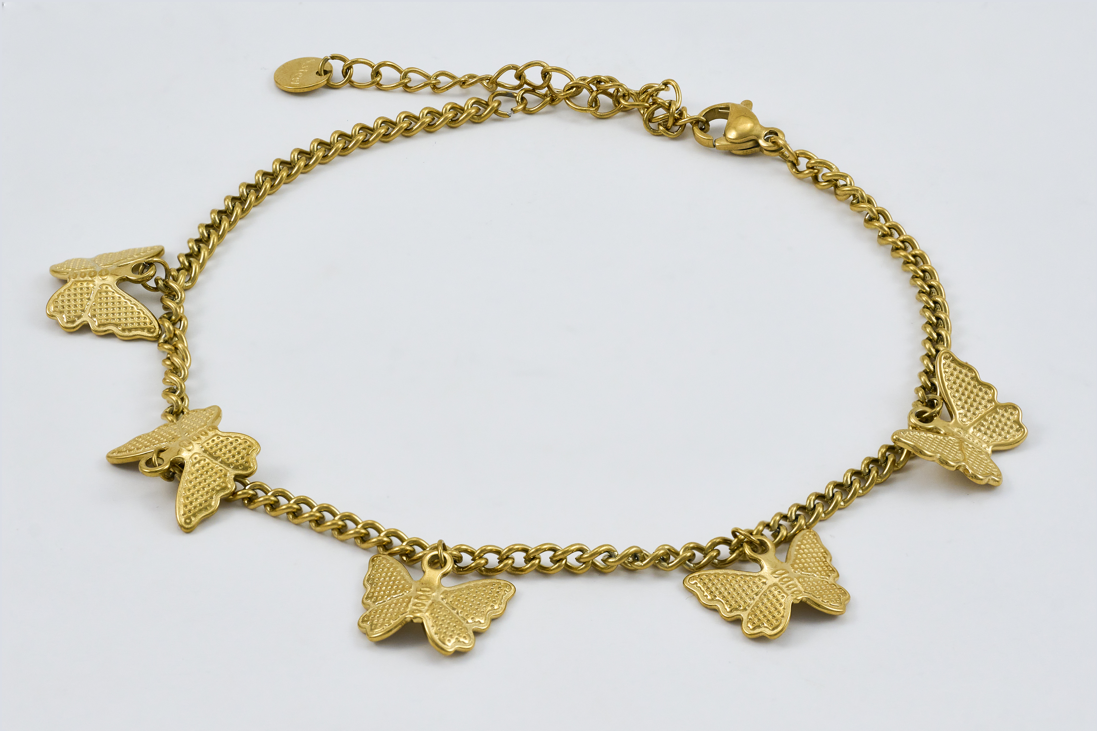 Vintage gouden enkelband met munten