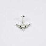 Zilveren buikpiercing met sprankelende steentjes