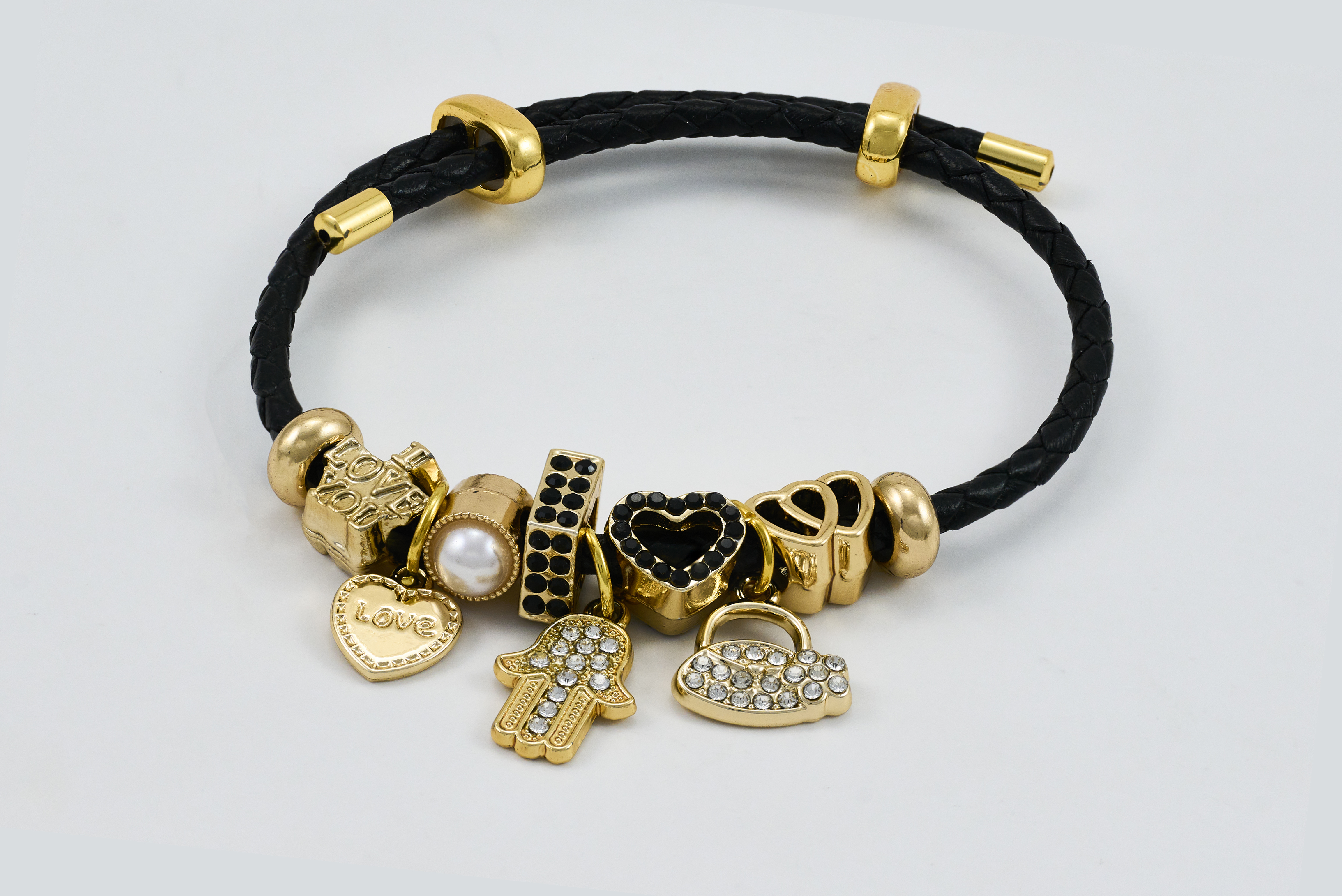 Zwarte koordarmband met gouden kralen en luxe afwerking