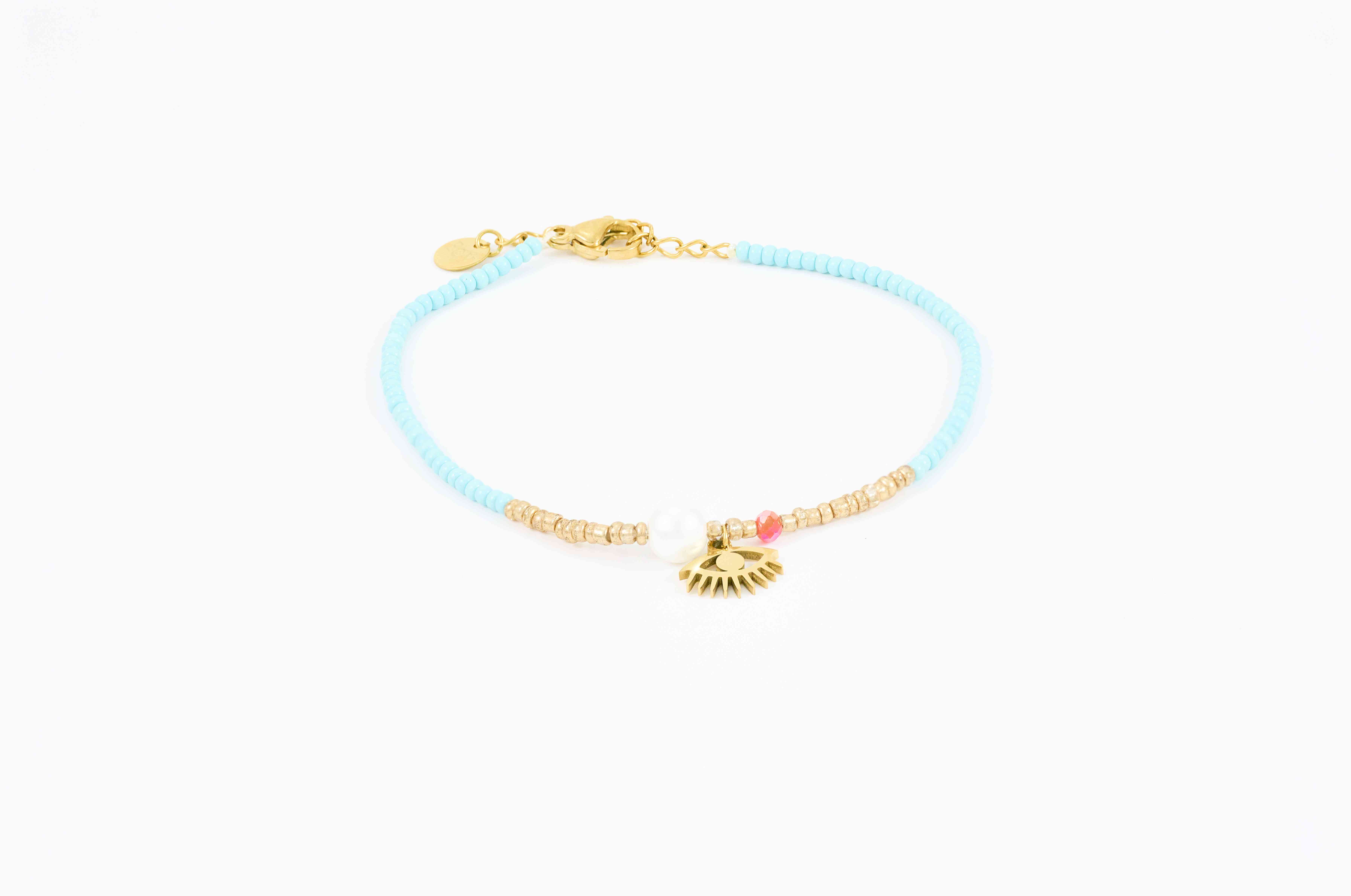 Blauwe bohemian enkelband met gouden accenten