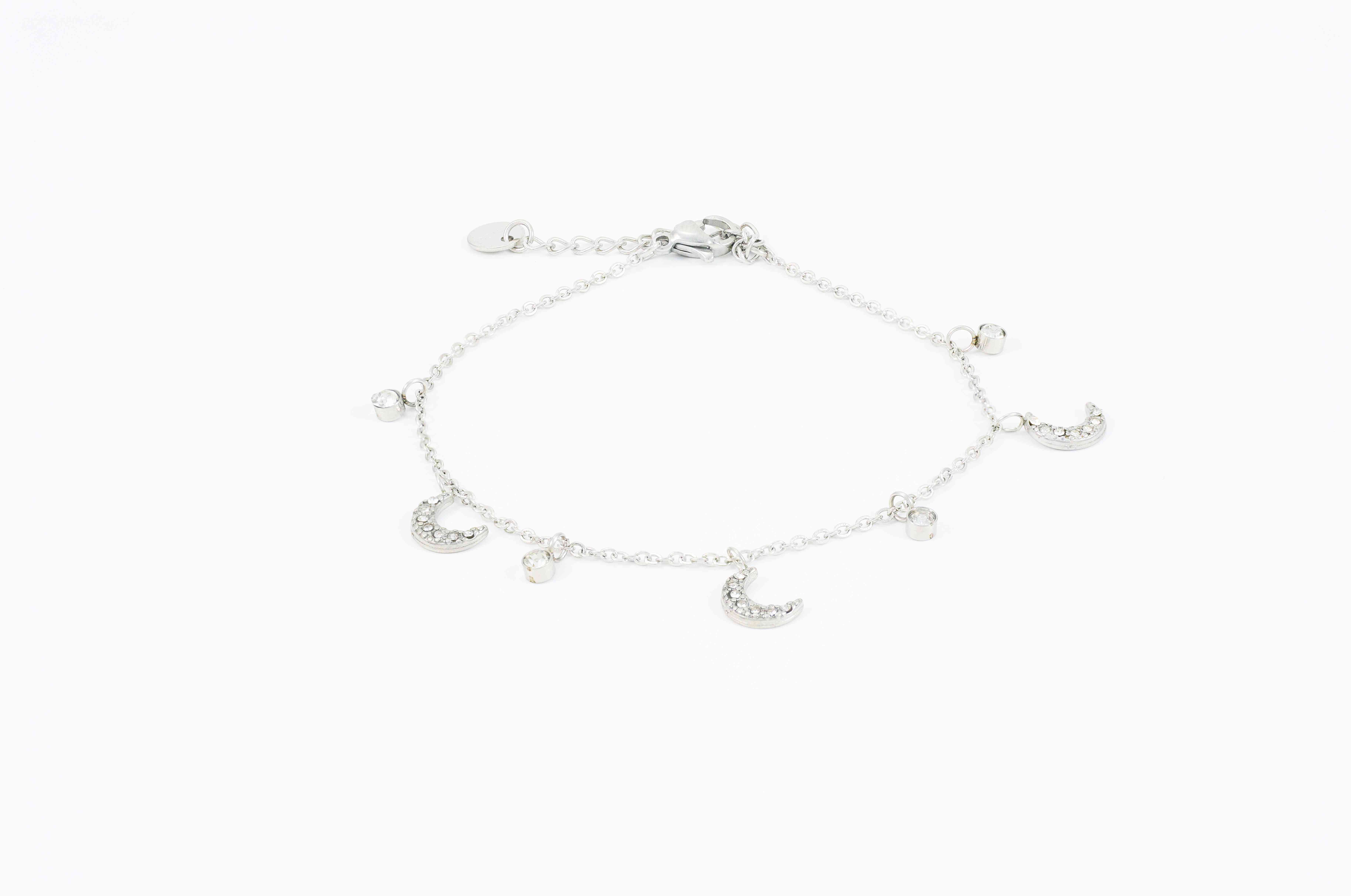 Elegante zilveren enkelband met maantjes en sterren