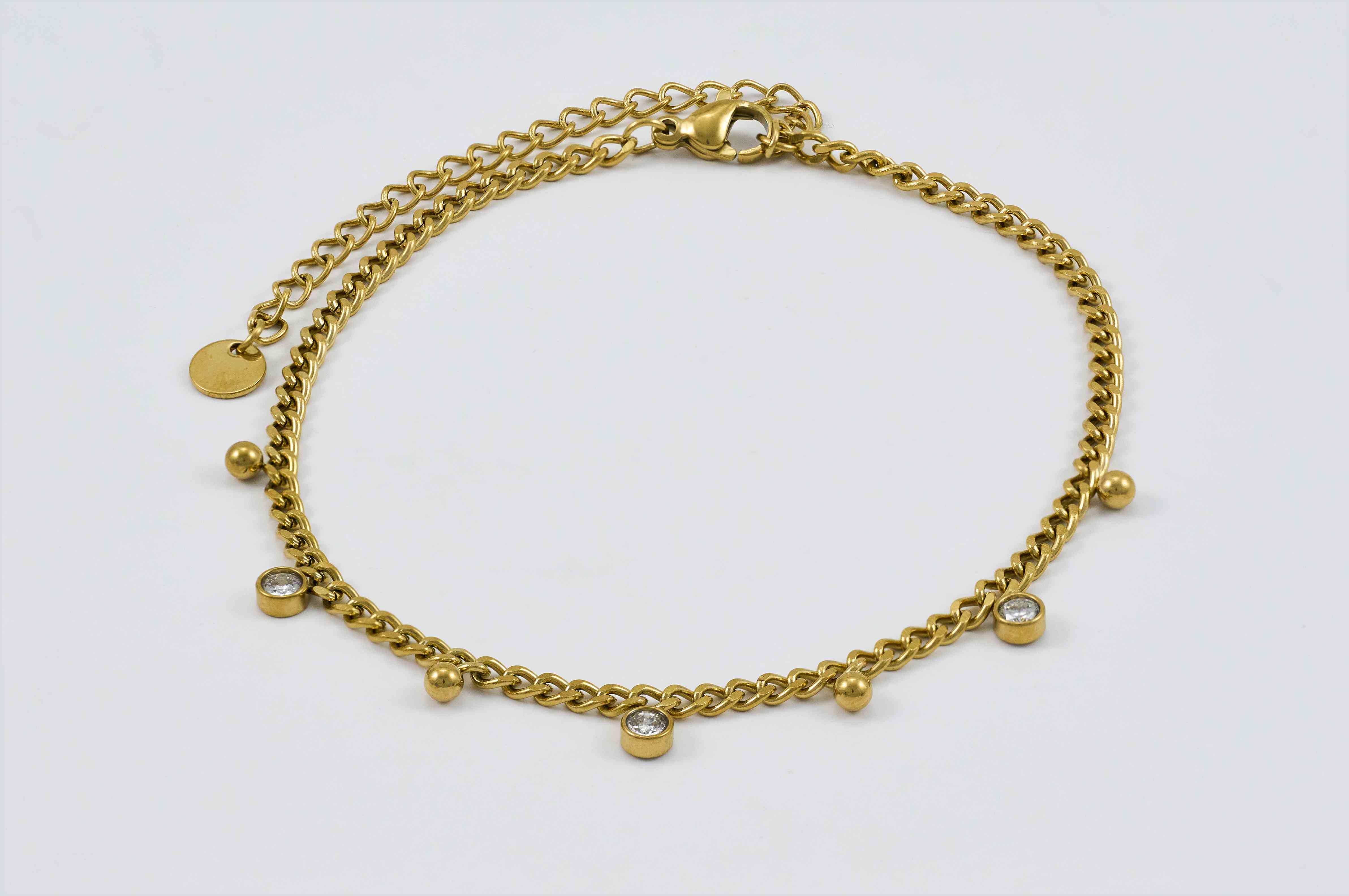 Luxe gouden enkelband met hangende bedels